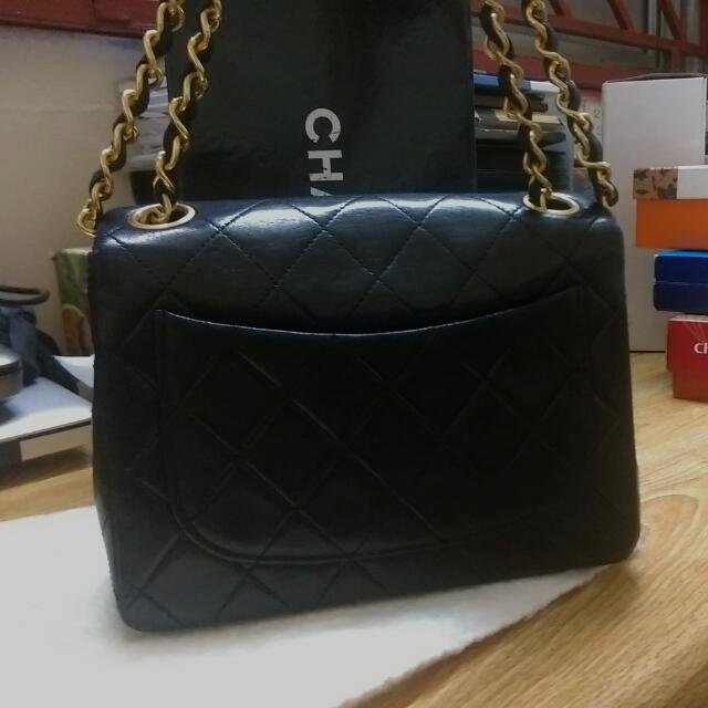 with card , dust bag and box  small black bag with gold chain 4