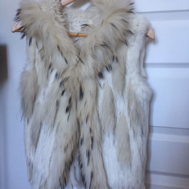 white fur hooded vest