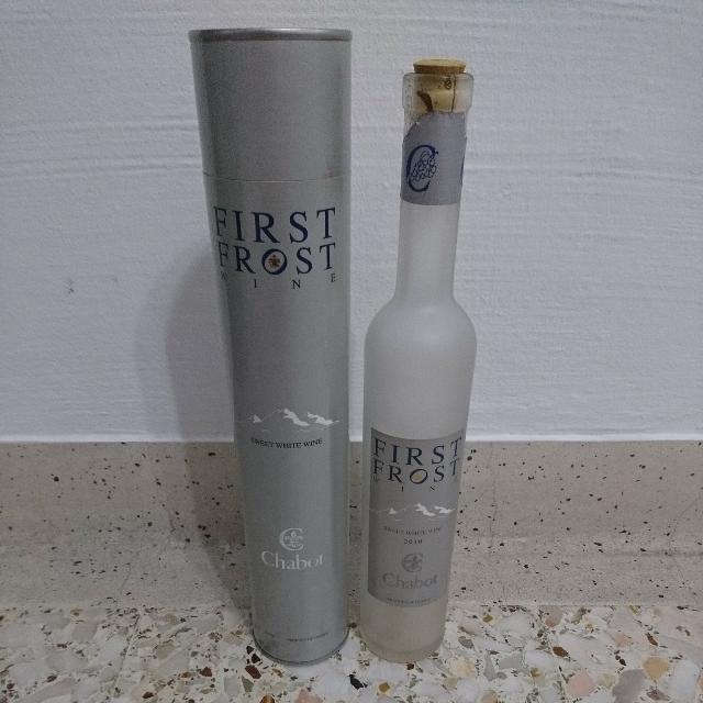 empty first frost wine bottle