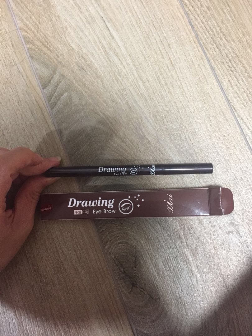 drawing eyebrow pencil in natural brown