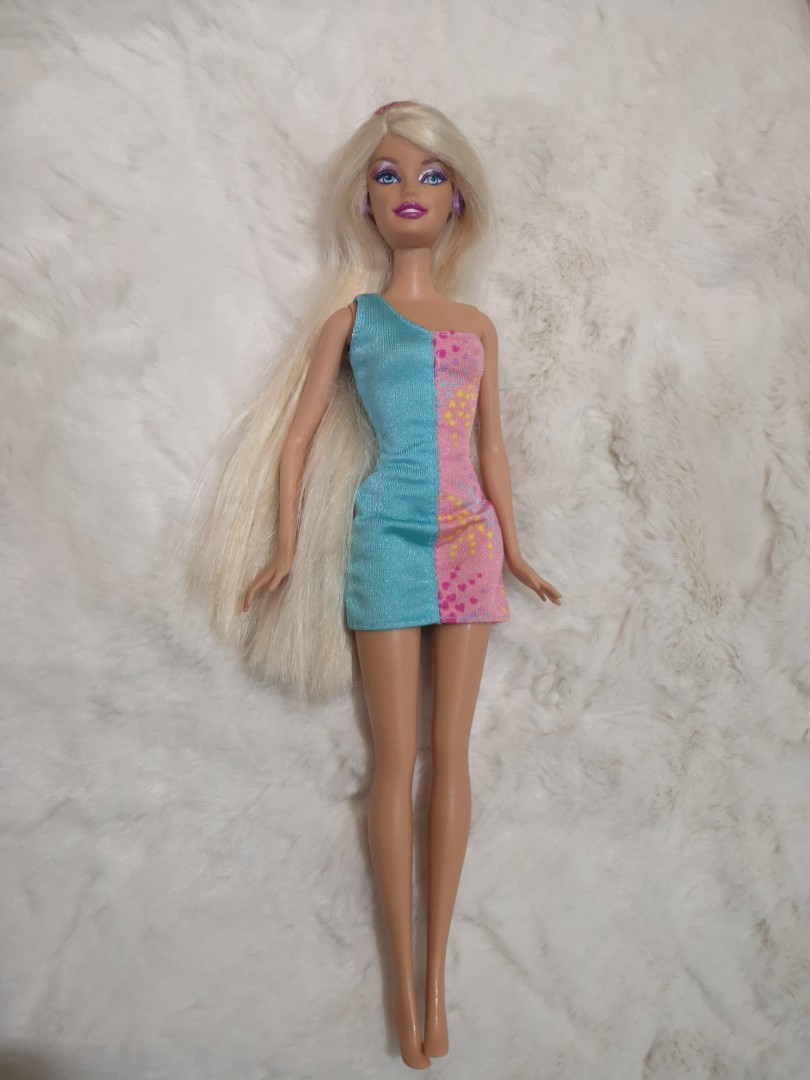 barbie dolls (free extra dress)