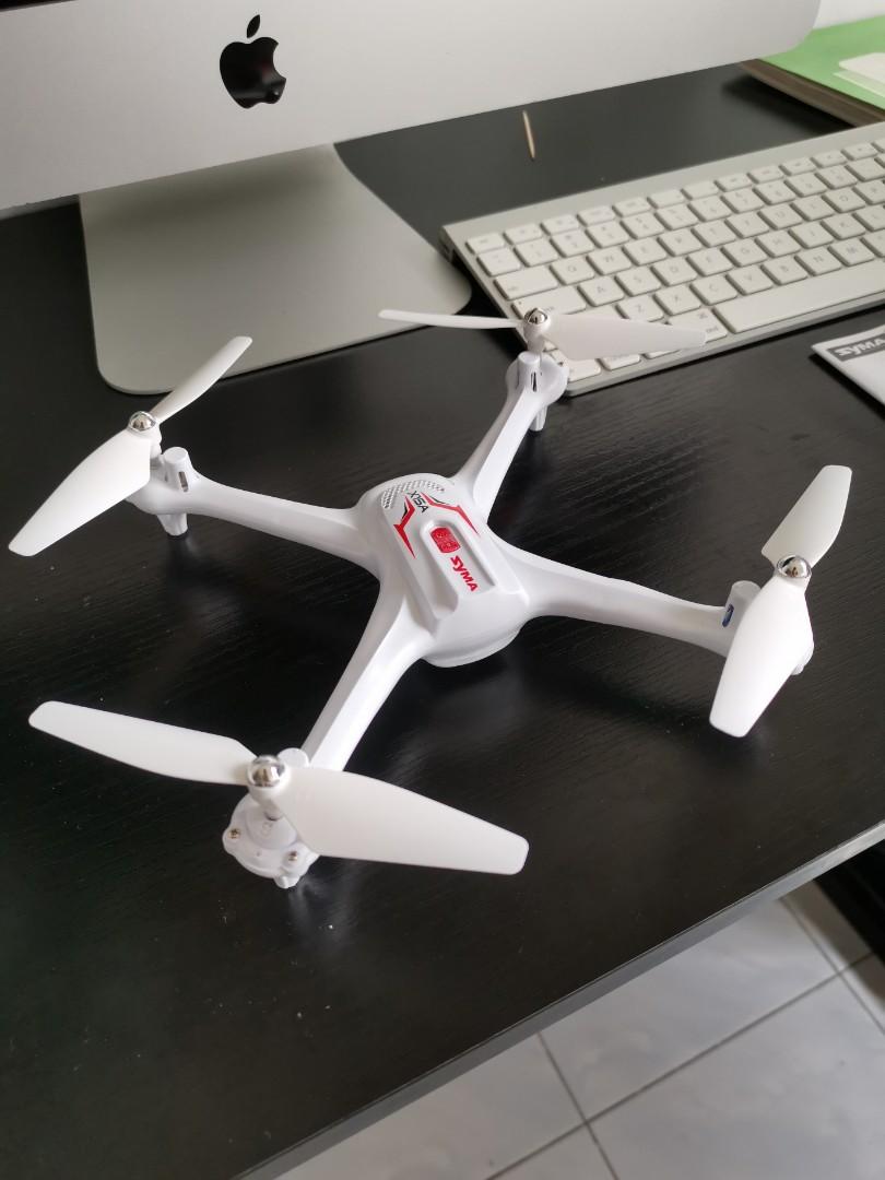 drone syma x15a 2 spare batteries and propellers