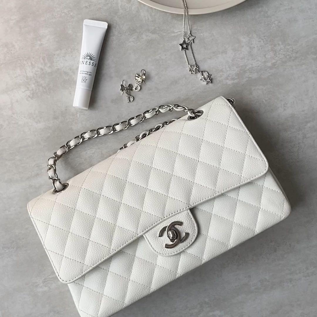 Chanel Vintage Medium Classic Flap in white caviar silver hardware, Luxury,  Bags & Wallets on Carousell