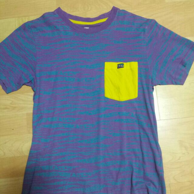 purple and aqua nike shirt