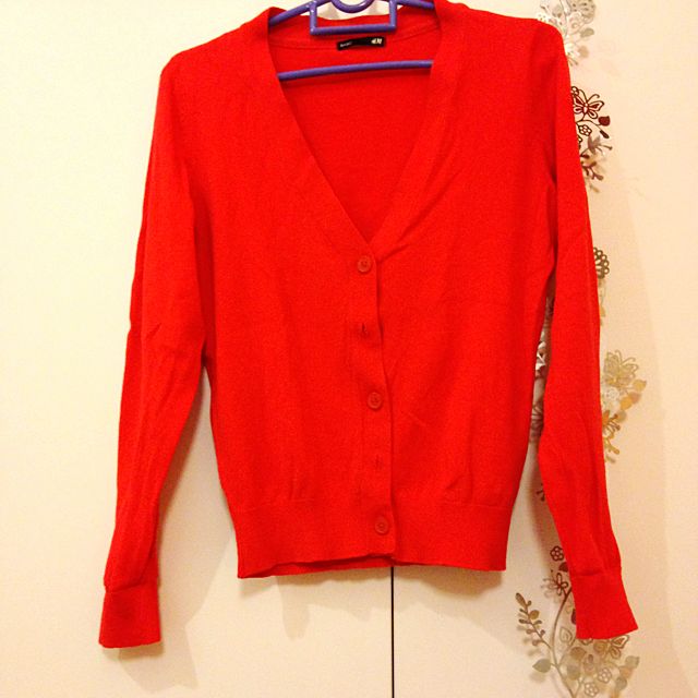 bright red cardigan