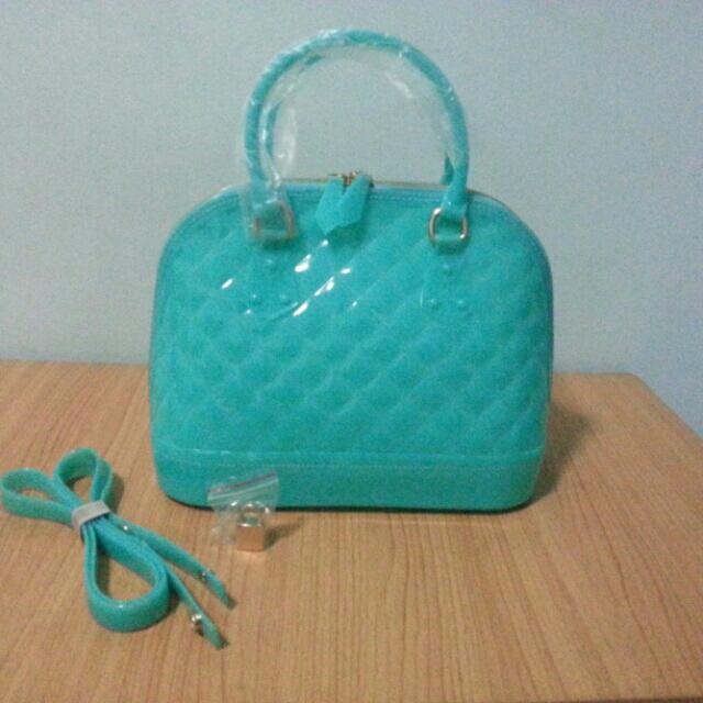 Louis Vuitton INSPIRED jelly bag in turquoise, Women's Fashion, Bags &  Wallets, Purses & Pouches on Carousell
