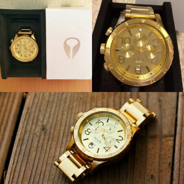 All gold nixon watch online