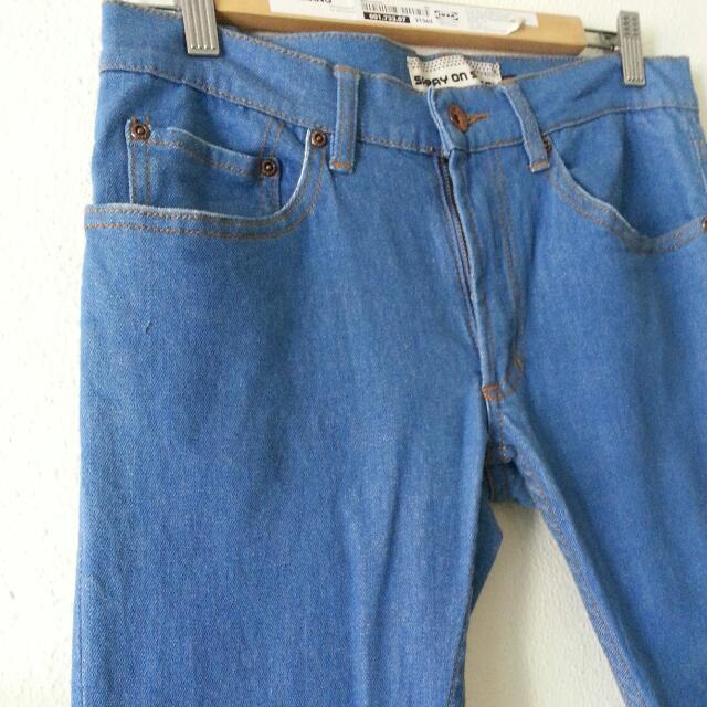 light blue spray on jeans
