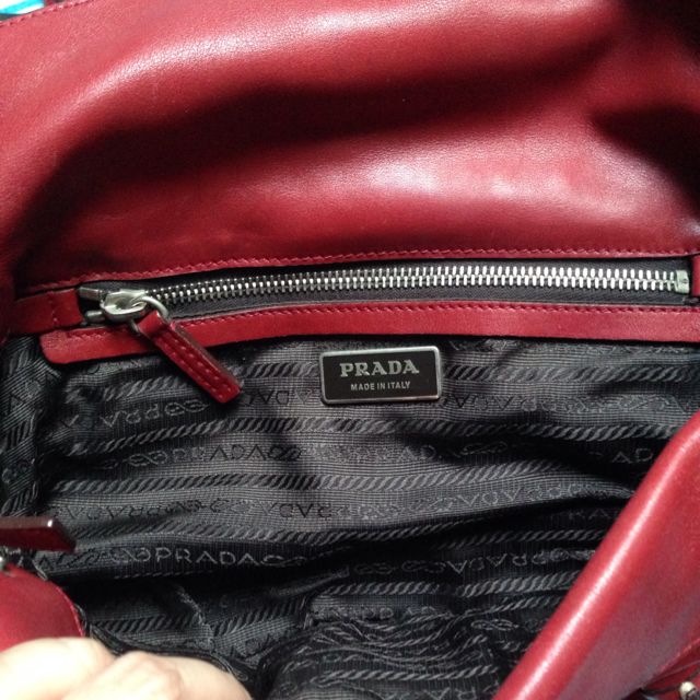 Red leather new arrivals prada handbag