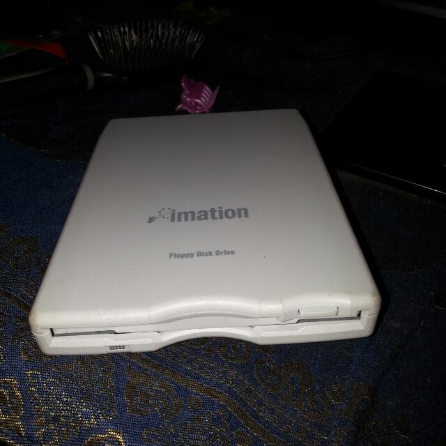 External Floppy Disk (Category: Everything Else) located in Singapore. Submitted by laboranz (Listing ID 5713320, Image 1). Description: Buy.. But Never use b4.. Imation 1.44MB External USB Floppy Disk Drive The Imation USB floppy drive is an external storage device. It has a simple, one cable connection and sleek lightweight design that is ideal for home, student and business users. This device enhances laptops and desktops that do not have a fl
