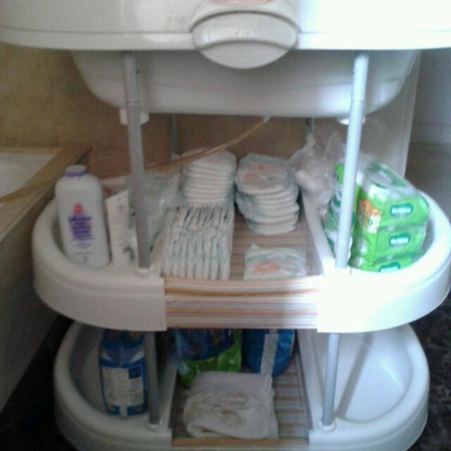 Mothercare integrated changing table baby bath and storage shelves