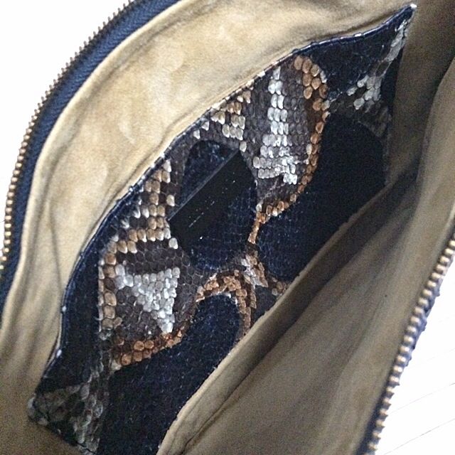 Ling Wu Python Document Bag (Category: Accessories) located in Singapore. Submitted by youbuyuhuat (Listing ID 5859469, Image 2). Description: local bag designer Ling Wu Specially Customized 100% python skin Hand painted ( Navy ) Interior fully lined with suede Interior python pocket with embossed metal plaque Navy blue Length: 39cm Height: 37cm Comes with dust bag n care card No Trade Tag: Ling Wu clutch python skin document bag.