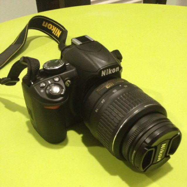 dslr camera d3100 price