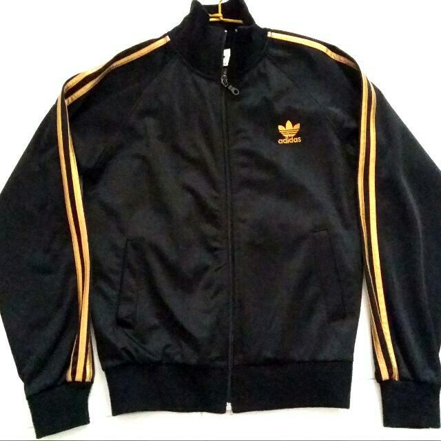 Black adidas jacket deals with gold stripes