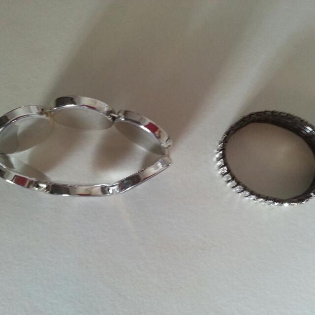 Blessing Braclets (Category: Free Items) located in Singapore. Submitted by gracious123 (Listing ID 7605886, Image 2). Description: Blessing Braclet 1. Grey Colour in circled design. Blessing Braclet 2. Black with Crystals with elasticity. Please kindly pay $3 for postage and handling fee..