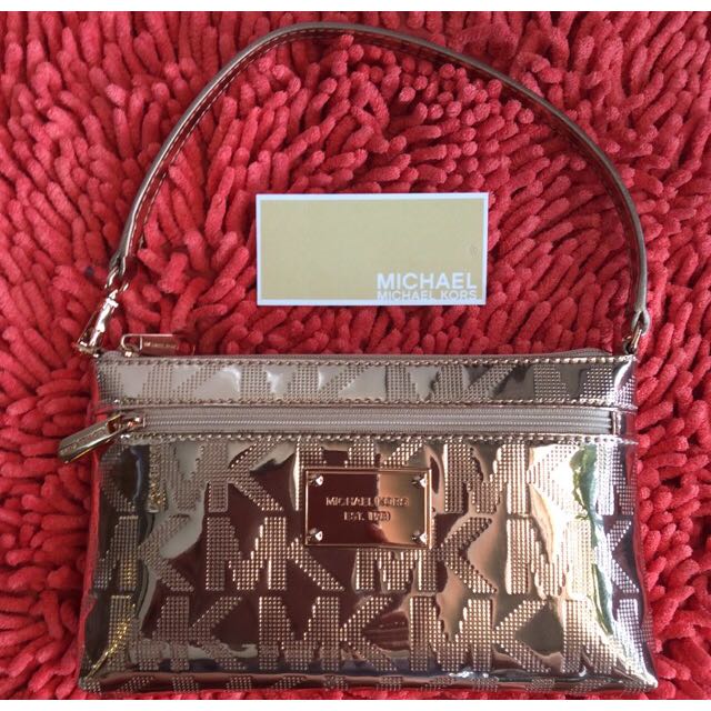 rose gold michael kors wristlet