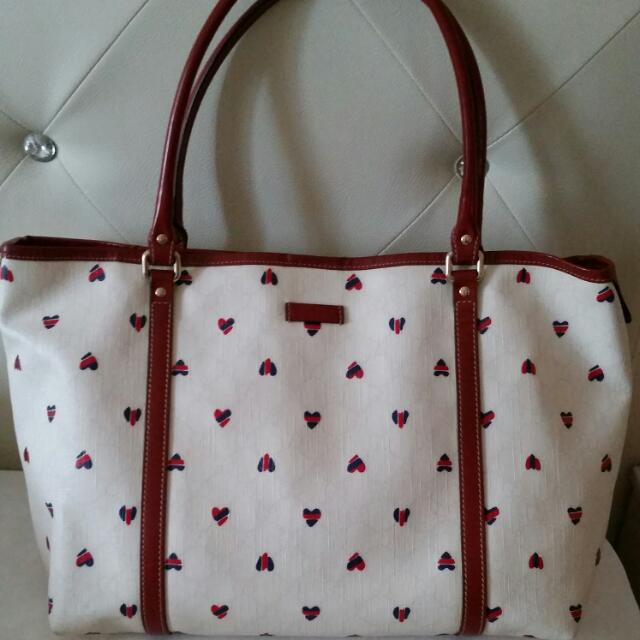 Red white and discount blue gucci purse