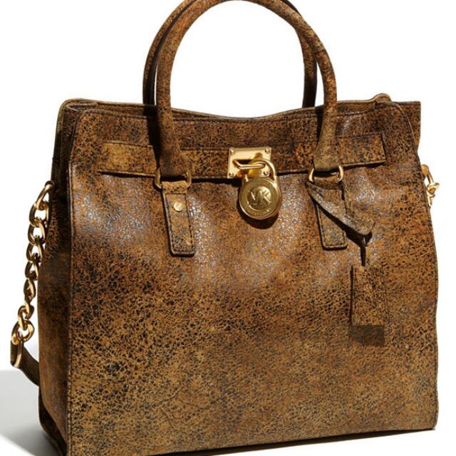 Distressed brown michael kors bag top