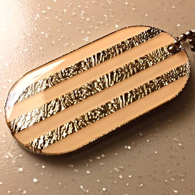 chanel dog tag