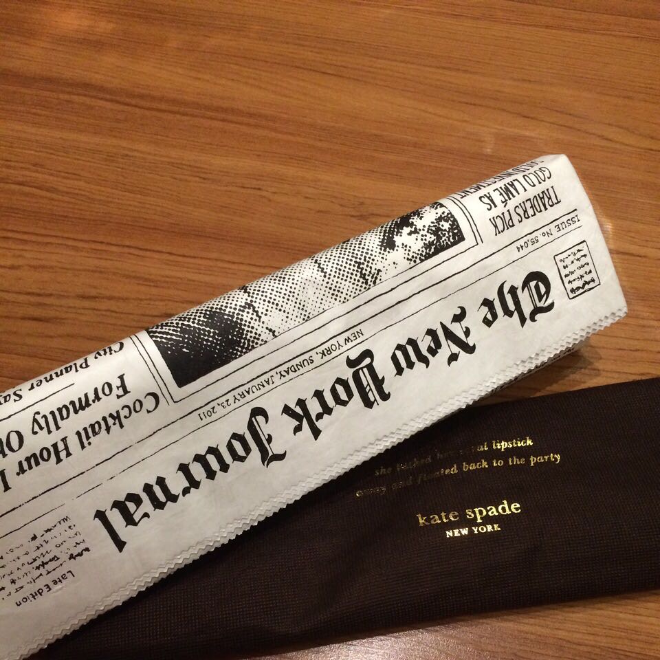 Newspaper clutch hotsell kate spade