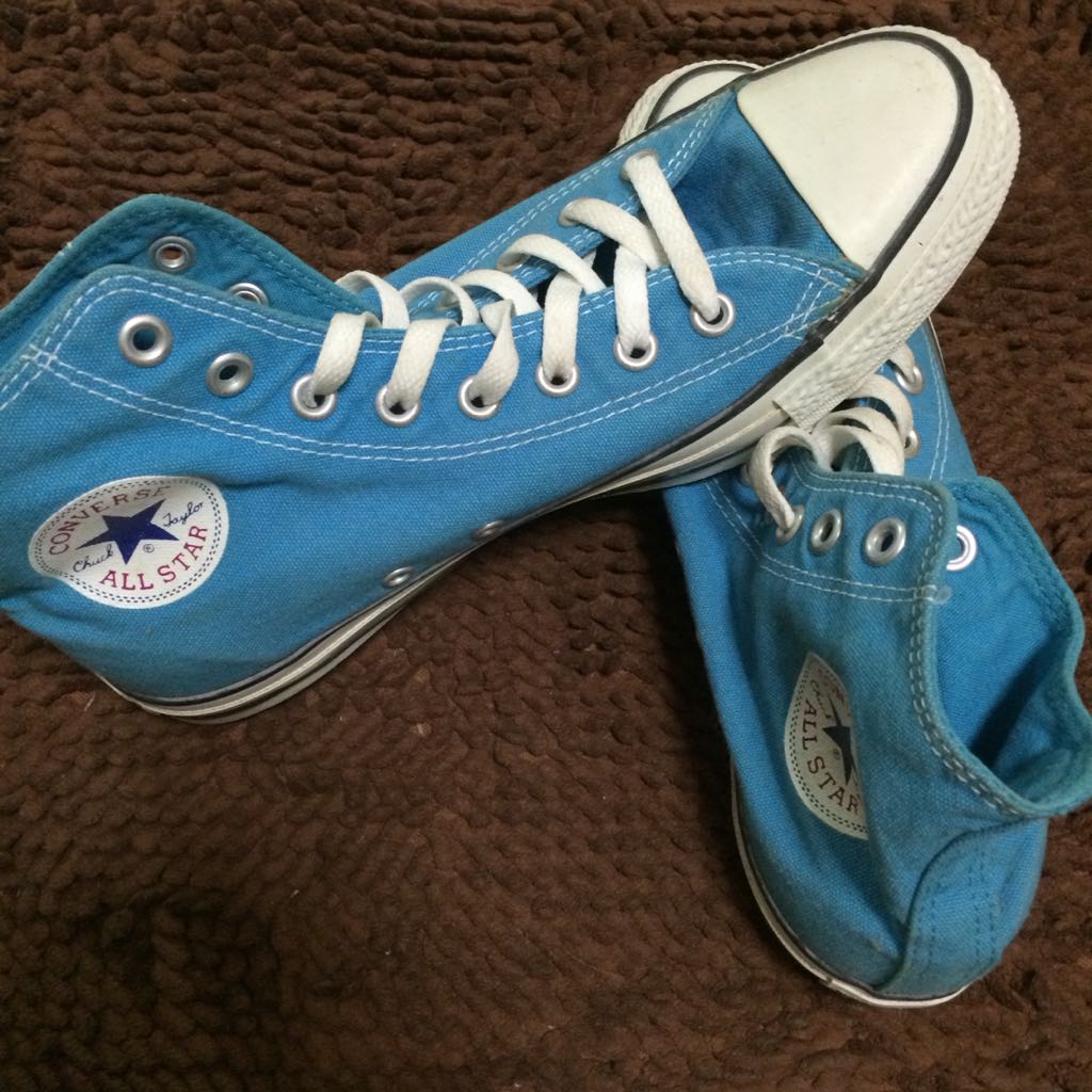 teal colored converse shoes