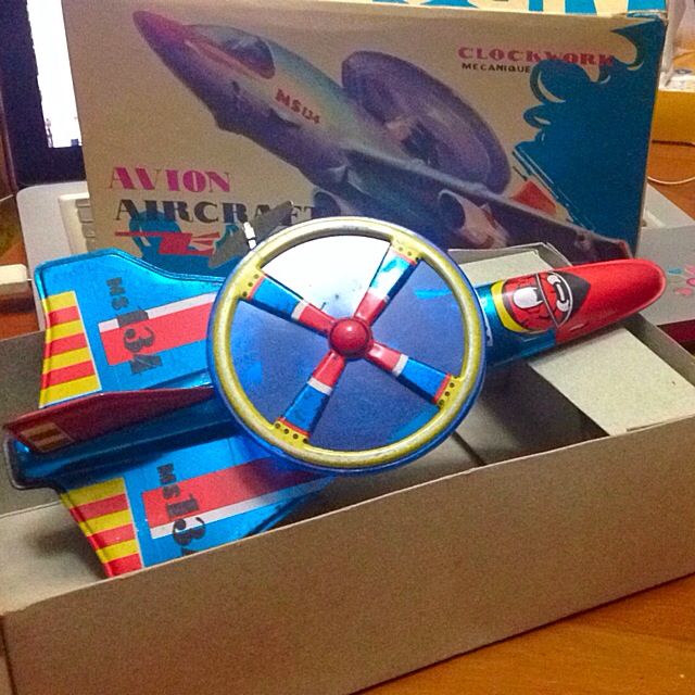 vintage tin toy airplanes