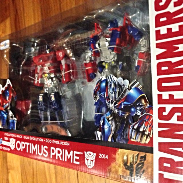 Transformers Toys R Us Exclusive Optimus Prime Evolution 2 Pack