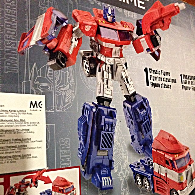 Transformers Toys R Us Exclusive Optimus Prime Evolution 2 Pack