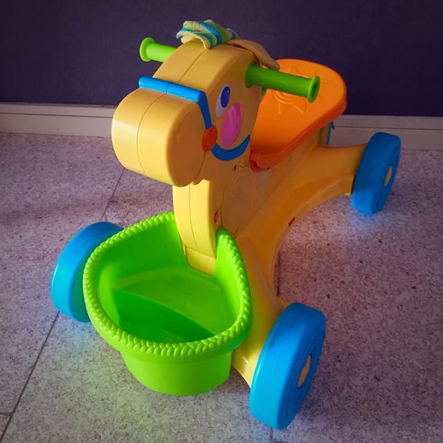 fisher price riding horse on wheels