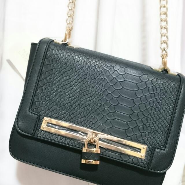 New look top sling bag