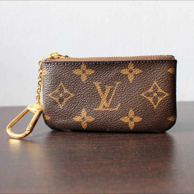 RESERVED] Louis Vuitton Key Pouch Monogram Canvas, Luxury, Bags & Wallets  on Carousell