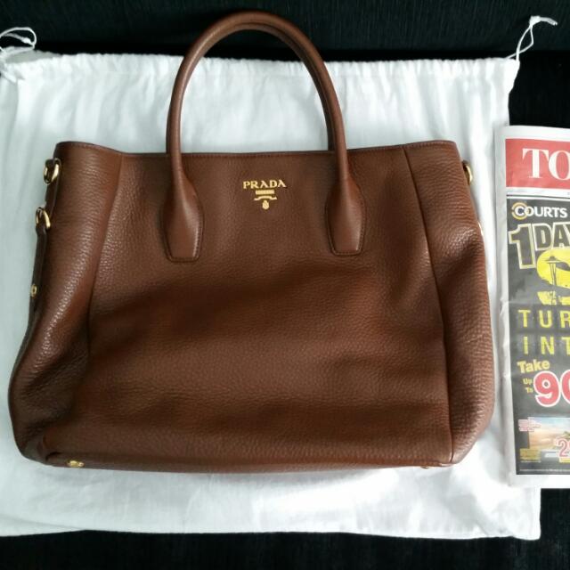 prada dinosaur bag