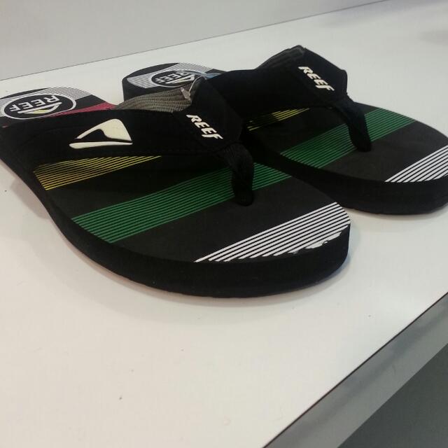 Reef rasta flip flops clearance