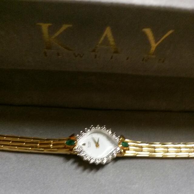 Ladies Pulsar Diamond And Emerald Watch With A 14 Carrot Solid