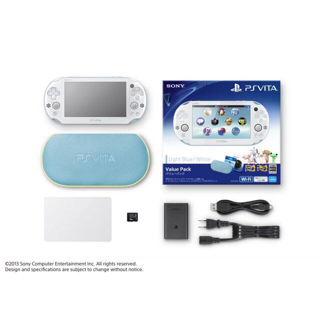 Playstation Vita Blue White Slim MIB. 16gb Memory. (Full box W