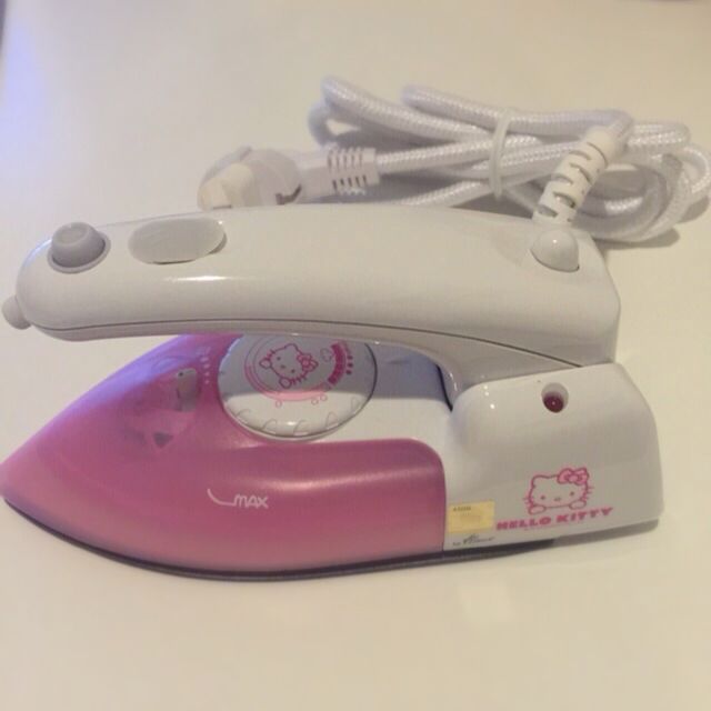 Authentic Hello Kitty Iron (Category: Wallets & Card Holders) located in Singapore. Submitted by fabrixoxo (Listing ID 18504321, Image 1). Description: .