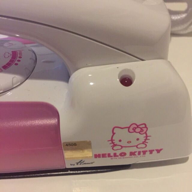 Authentic Hello Kitty Iron (Category: Wallets & Card Holders) located in Singapore. Submitted by fabrixoxo (Listing ID 18504321, Image 3). Description: .
