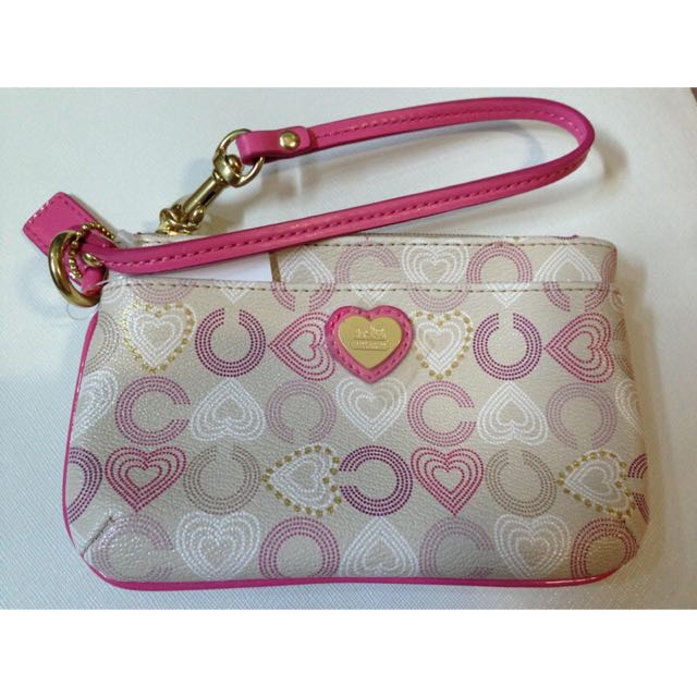 COACH Waverly Signature Small Wristlet in Pink