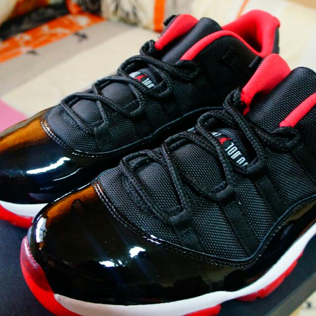 low top jordan 11 breds