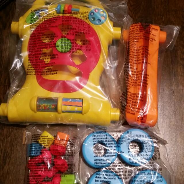 tiny steps walker with shape sorter activities