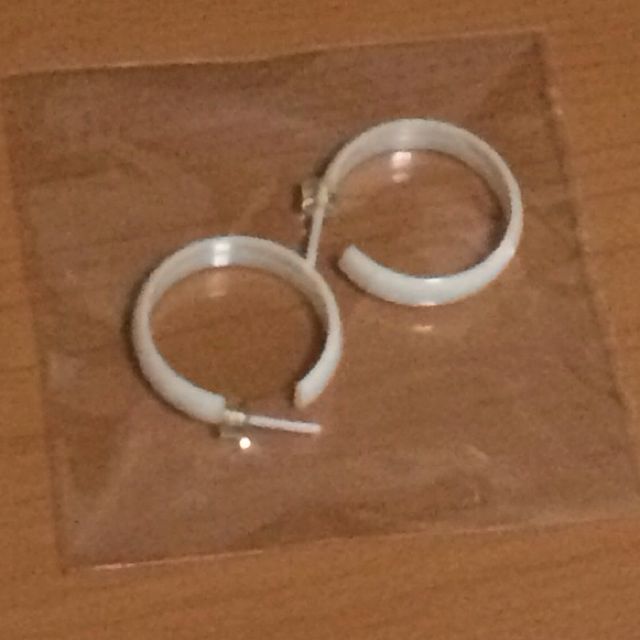 White plastic hoop earrings on sale