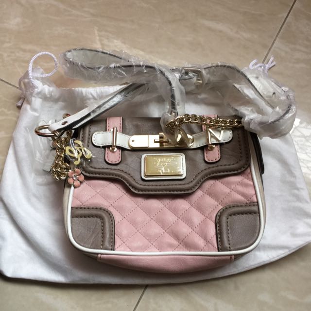 guess bag with charms