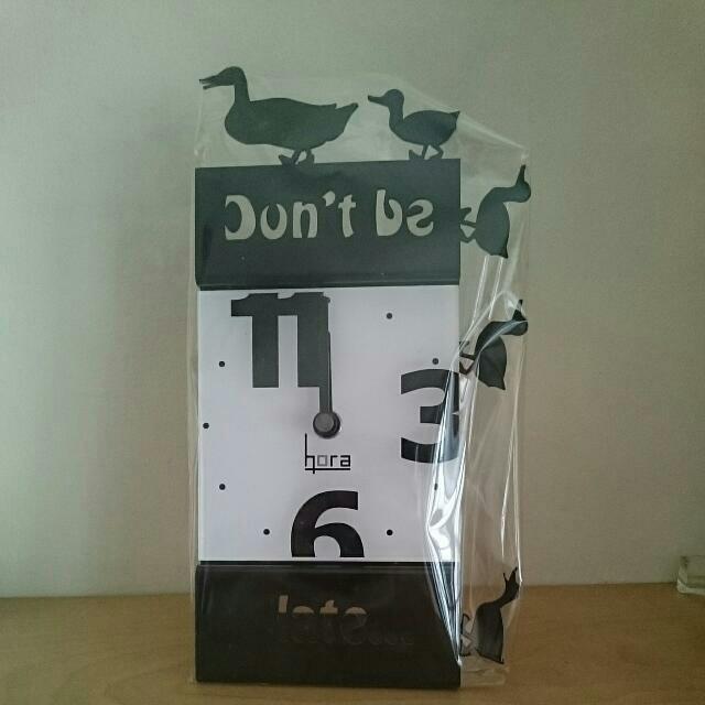 Table Clock (Category: Clocks) located in Singapore. Submitted by zerolimit (Listing ID 23806099, Image 2). Description: Don't Be Late Table Clock Description : table clock Materials : Steel and acrylic dial Dimension : 21.7 x 10.7 x 5 cm Battery: AA 1 piece.