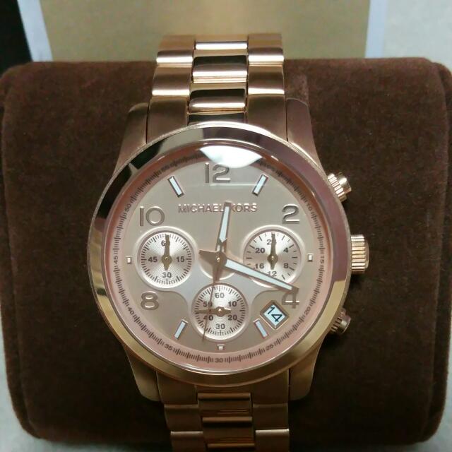 michael kors female gold watch