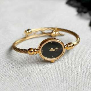 titan bangle type watch
