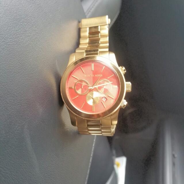 Michael kors best sale red face watch