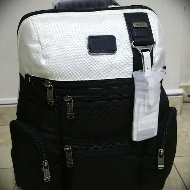 tumi black and white backpack