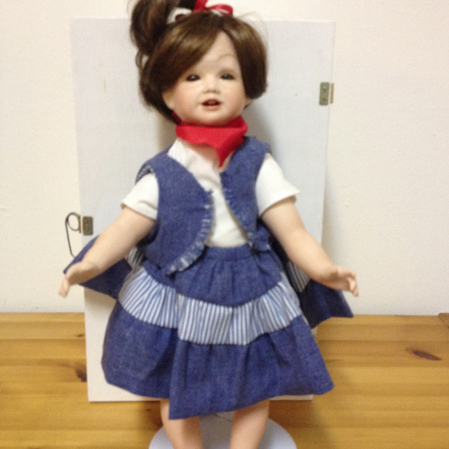 porcelain doll in wooden box