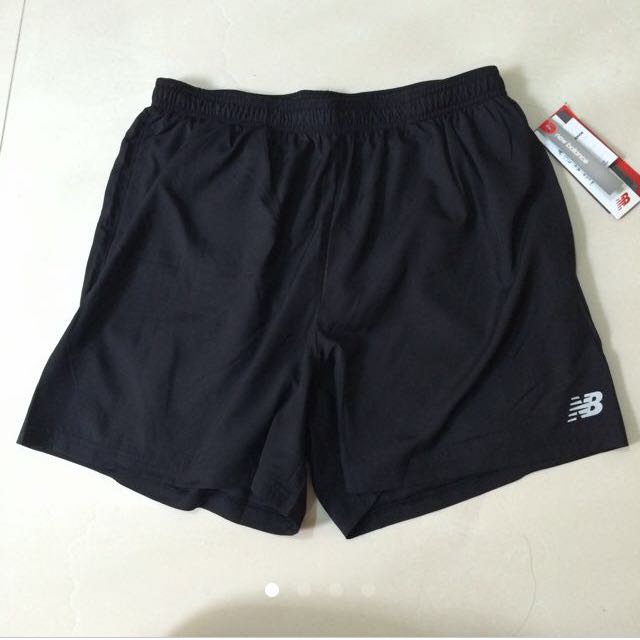 New balance lightning dry shorts top
