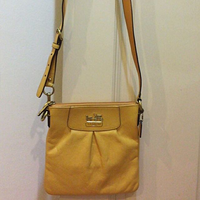 coach yellow sling bag